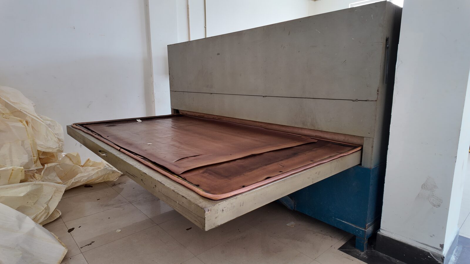 Wood grain transfer press
